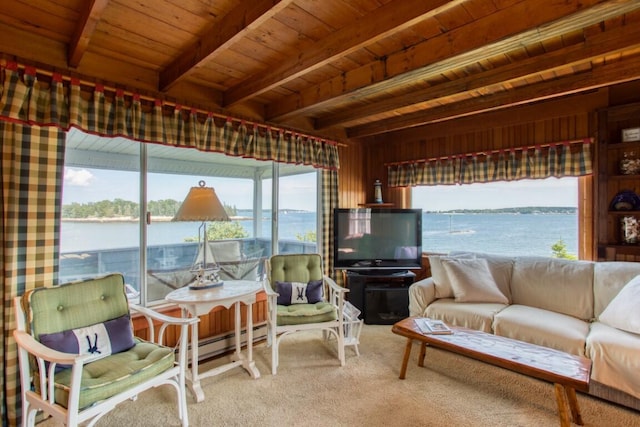 16 Tilton Ln, Southport, ME 04576 - carpeted living area with wooden ceiling with exposed beams and a baseboard radiator