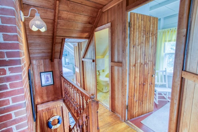 16 Tilton Ln, Southport, ME 04576 - hallway featuring wood walls, wood finished floors, lofted ceiling, and wooden ceiling