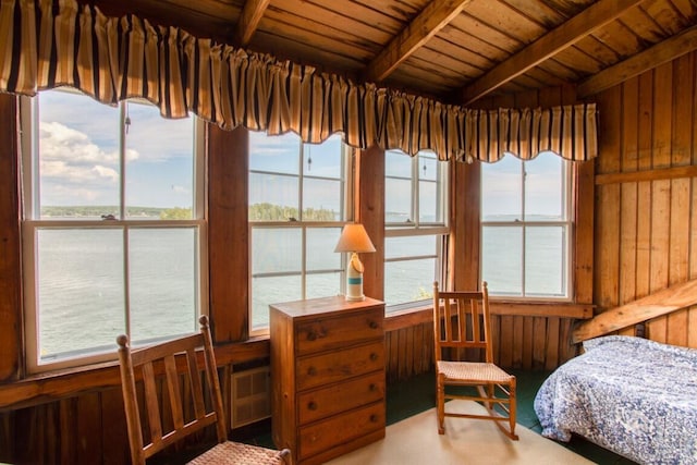 16 Tilton Ln, Southport, ME 04576 - bedroom with wood walls and wood ceiling with exposed beams