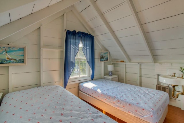 16 Tilton Ln, Southport, ME 04576 - bedroom featuring vaulted ceiling and wood finished floors