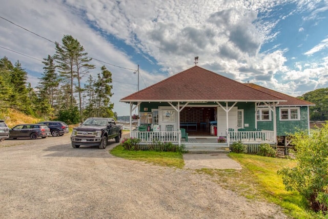 16 Tilton Ln, Southport, ME 04576 - bungalow-style home with covered porch