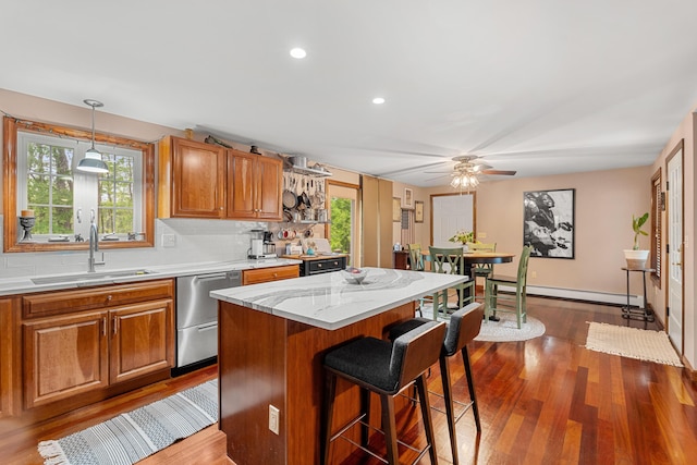 27 Wilmer Chase Rd, North Berwick, ME 03906 - kitchen with a sink, dark wood finished floors, healthy amount of natural light, dishwasher, and recessed lighting