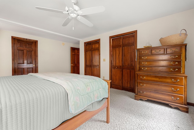 27 Wilmer Chase Rd, North Berwick, ME 03906 - bedroom featuring multiple closets, light carpet, and a ceiling fan