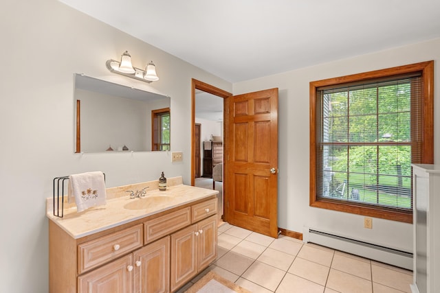 27 Wilmer Chase Rd, North Berwick, ME 03906 - bathroom featuring baseboard heating, vanity, tile patterned floors, and baseboards