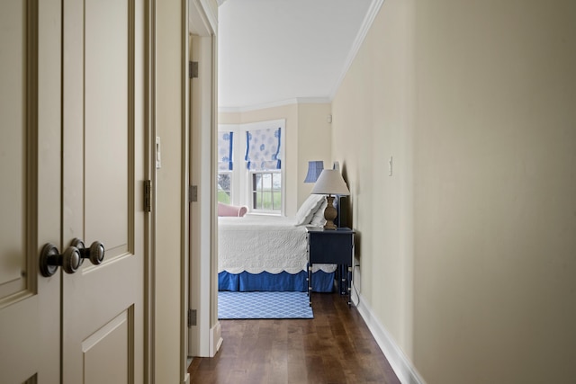 52 Lester B Orcutt Blvd, Biddeford, ME 04006 - corridor featuring dark wood finished floors, crown molding, and baseboards