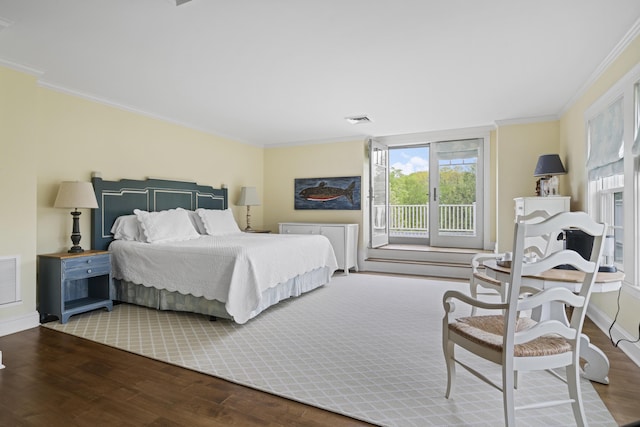 52 Lester B Orcutt Blvd, Biddeford, ME 04006 - bedroom with wood finished floors, access to outside, ornamental molding, and baseboards
