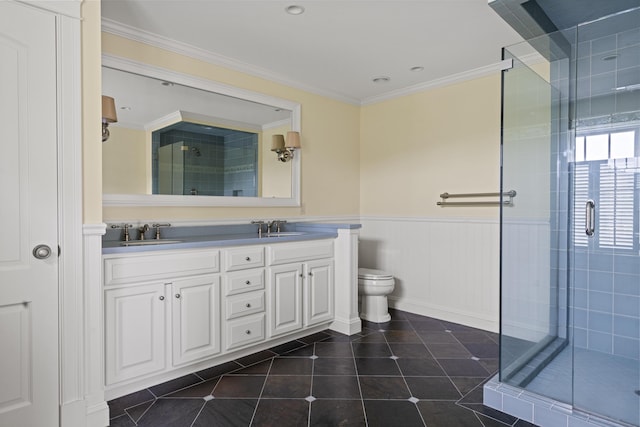 52 Lester B Orcutt Blvd, Biddeford, ME 04006 - full bathroom featuring a shower stall, double vanity, crown molding, toilet, and wainscoting