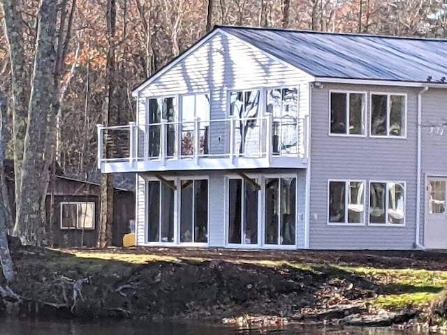 5 N Vigue Shore Rd, Albion, ME 04910 - rear view of property with a balcony