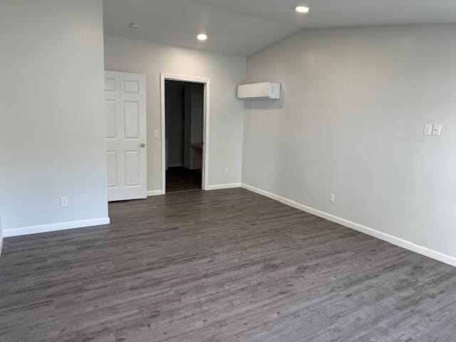 5 N Vigue Shore Rd, Albion, ME 04910 - spare room featuring baseboards, dark wood-type flooring, recessed lighting, and lofted ceiling
