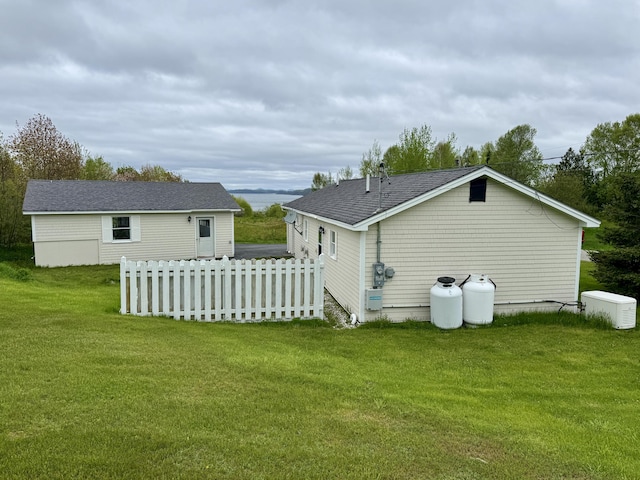 2 Cemetery Rd, Eastport, ME 04631 - back of house featuring roof with shingles
