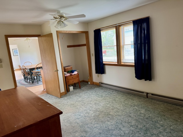 2 Cemetery Rd, Eastport, ME 04631 - bedroom featuring a baseboard radiator, carpet, and a ceiling fan