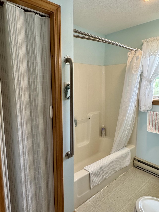 2 Cemetery Rd, Eastport, ME 04631 - bathroom with shower / bath combo, baseboard heating, a textured ceiling, and tile patterned floors
