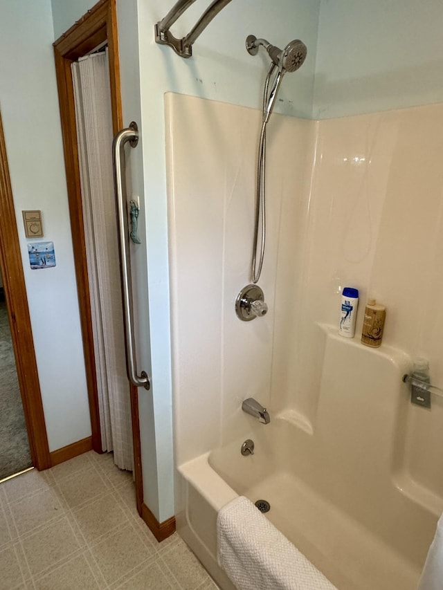 2 Cemetery Rd, Eastport, ME 04631 - full bathroom with tile patterned floors, tub / shower combination, and baseboards