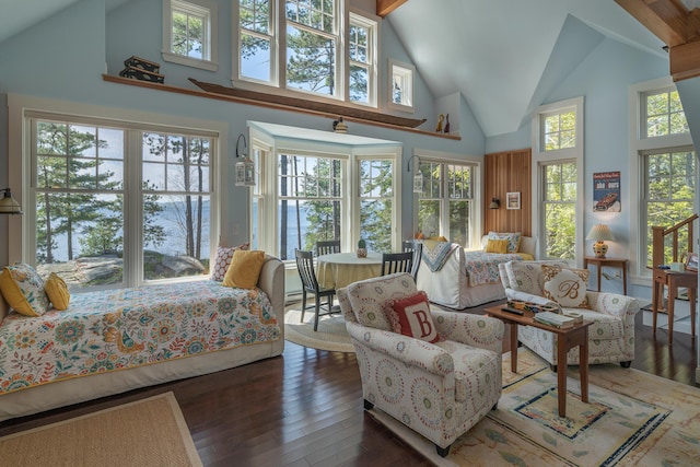 361 Cape Rd, Raymond, ME 04071 - bedroom featuring high vaulted ceiling, multiple windows, and hardwood / wood-style flooring