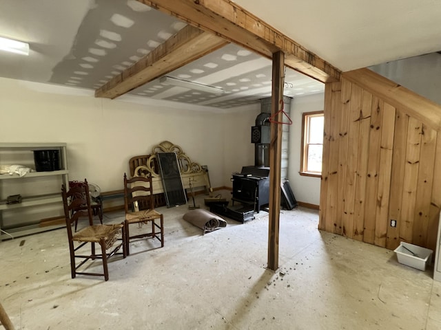 640 Bald Mountain Rd, Rangeley, ME 04970 - below grade area with a wood stove