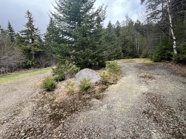 640 Bald Mountain Rd, Rangeley, ME 04970 - view of street with a wooded view