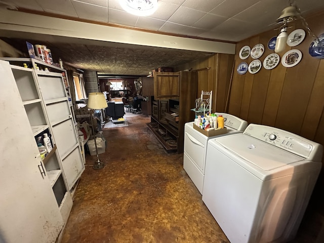 694 Calais Rd, Hodgdon, ME 04730 - washroom featuring separate washer and dryer and wooden walls