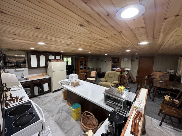 694 Calais Rd, Hodgdon, ME 04730 - kitchen with white appliances, wood ceiling, light countertops, and a sink
