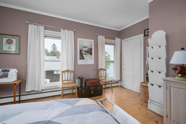 116 Whipple Rd, Kittery, ME 03904 - bedroom with crown molding, light wood finished floors, and baseboard heating