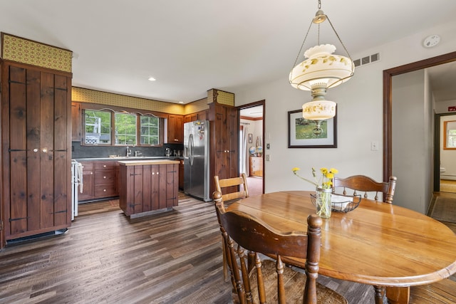 14 Lakeshore Dr, Belgrade, ME 04918 - dining space with dark wood-style flooring and recessed lighting