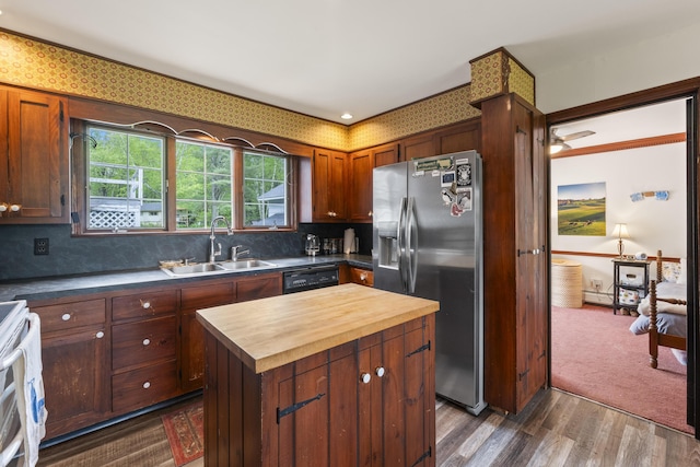 14 Lakeshore Dr, Belgrade, ME 04918 - kitchen featuring stainless steel fridge with ice dispenser, butcher block counters, a sink, black dishwasher, and a center island
