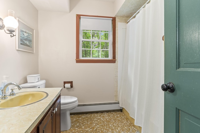 14 Lakeshore Dr, Belgrade, ME 04918 - bathroom with a baseboard heating unit, toilet, and vanity