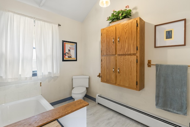 14 Lakeshore Dr, Belgrade, ME 04918 - bathroom featuring baseboard heating, a bath, toilet, lofted ceiling, and wood finished floors