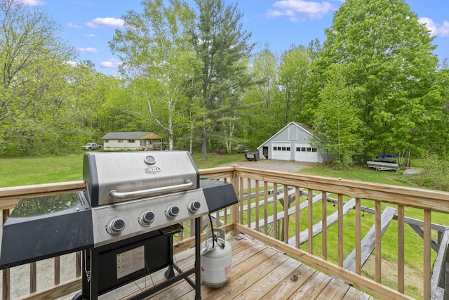 14 Lakeshore Dr, Belgrade, ME 04918 - wooden deck featuring a garage, an outbuilding, and a yard