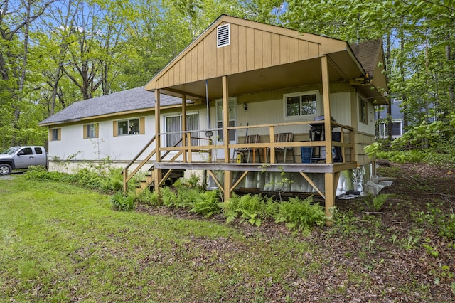 14 Lakeshore Dr, Belgrade, ME 04918 - view of front of property with roof with shingles and a front yard