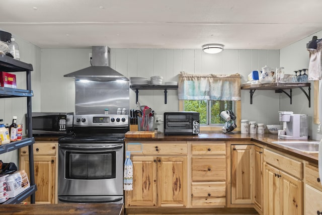 14 Lakeshore Dr, Belgrade, ME 04918 - kitchen with stainless steel electric range oven, wall chimney exhaust hood, open shelves, and dark countertops