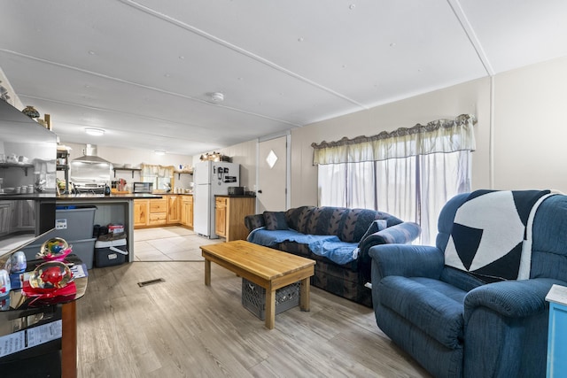 14 Lakeshore Dr, Belgrade, ME 04918 - living area with light wood-style floors