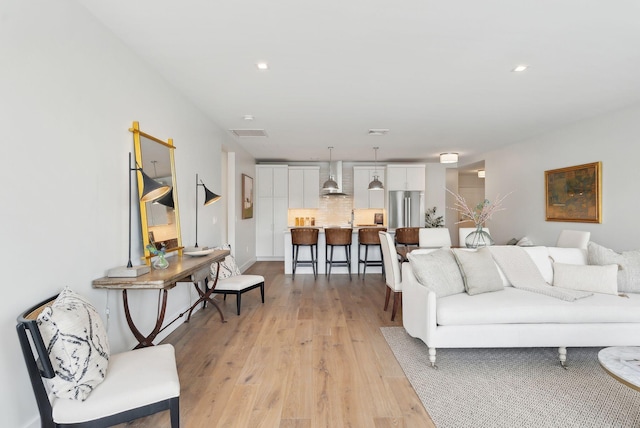 267 US Route 1 Unit 206, Falmouth, ME 04105 - living area featuring light wood-type flooring and recessed lighting