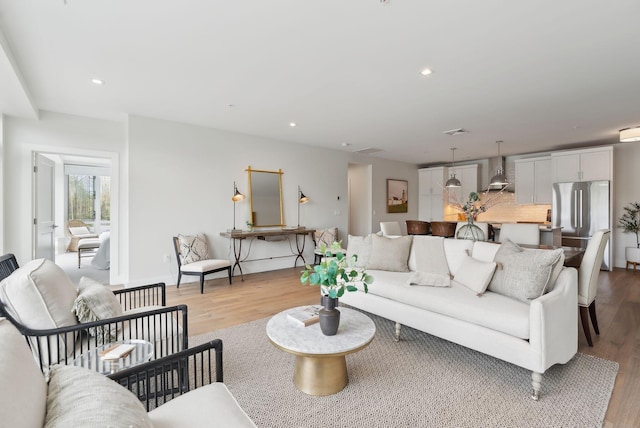 267 US Route 1 Unit 206, Falmouth, ME 04105 - living room featuring light wood-style floors and recessed lighting