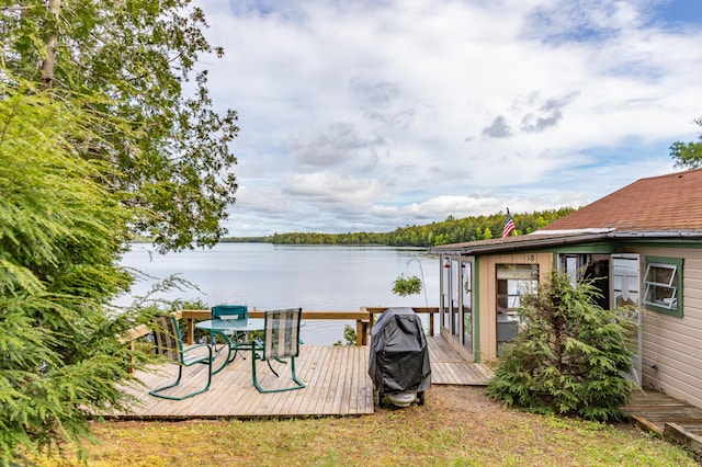 18 Breezy Knoll Dr, Princeton, ME 04668 - wooden terrace with a water view