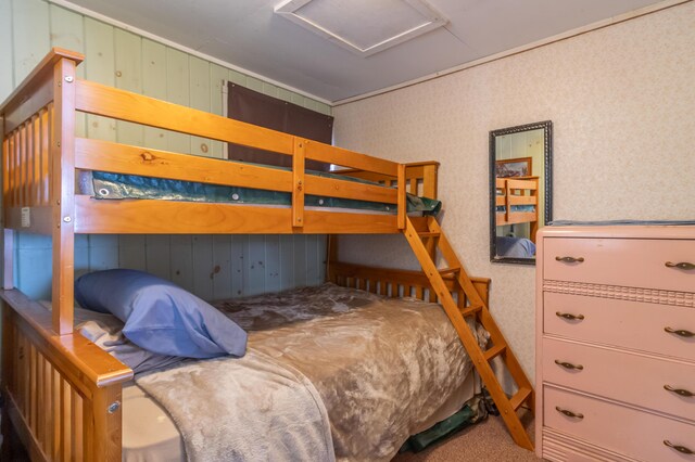 18 Breezy Knoll Dr, Princeton, ME 04668 - carpeted bedroom featuring attic access and wood walls