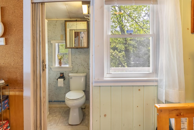 18 Breezy Knoll Dr, Princeton, ME 04668 - bathroom with healthy amount of natural light, toilet, and wallpapered walls