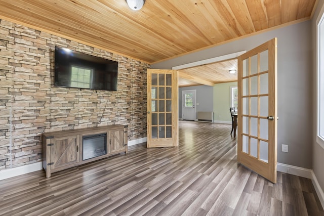 301 Pine Springs Rd, Shapleigh, ME 04076 - unfurnished living room featuring wood ceiling, french doors, ornamental molding, baseboards, and wood finished floors