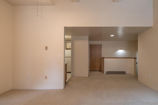 20 W St Unit 3, Portland, ME 04102 - carpeted spare room featuring a baseboard heating unit and recessed lighting