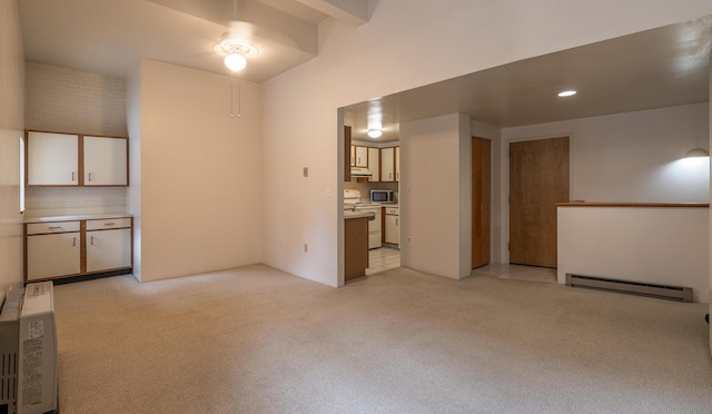 20 W St Unit 3, Portland, ME 04102 - unfurnished living room with a baseboard heating unit and light carpet
