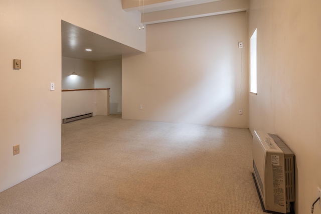 20 W St Unit 3, Portland, ME 04102 - carpeted empty room featuring a baseboard heating unit and heating unit