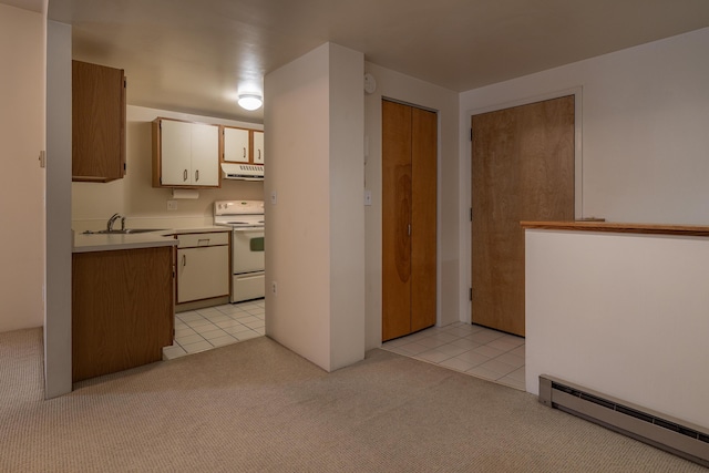 20 W St Unit 3, Portland, ME 04102 - kitchen with white range with electric cooktop, a baseboard radiator, light carpet, range hood, and light tile patterned floors