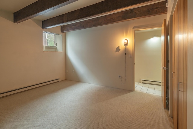 20 W St Unit 3, Portland, ME 04102 - spare room with baseboard heating, light colored carpet, beam ceiling, a baseboard radiator, and light tile patterned floors