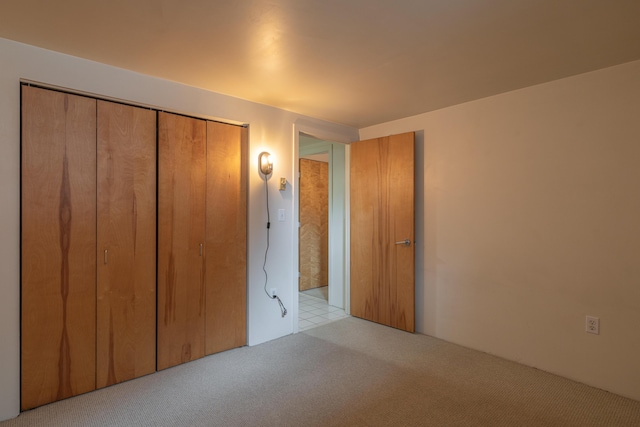 20 W St Unit 3, Portland, ME 04102 - unfurnished bedroom with light carpet and a closet