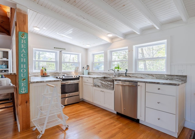 11 Saccarappa Ln, Scarborough, ME 04074 - kitchen with stainless steel appliances, light wood-style flooring, white cabinetry, light stone countertops, and wooden ceiling