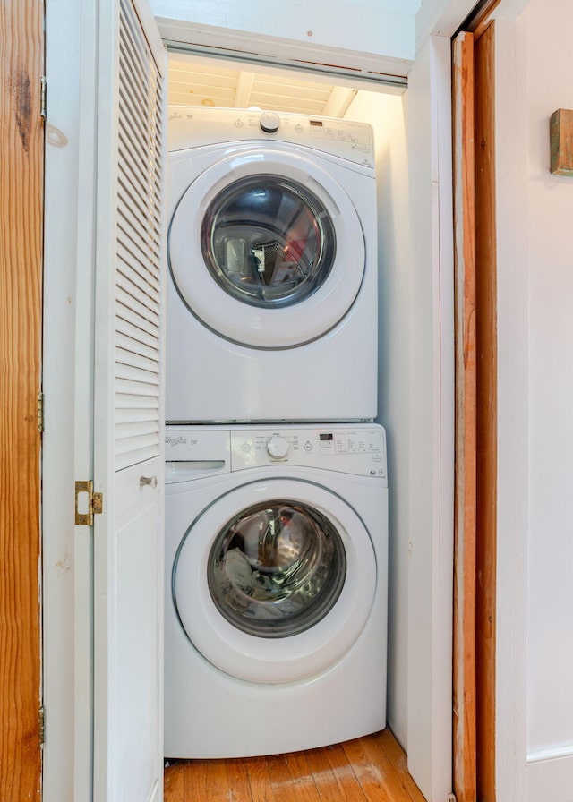 11 Saccarappa Ln, Scarborough, ME 04074 - laundry area with estacked washer and dryer and light wood-type flooring