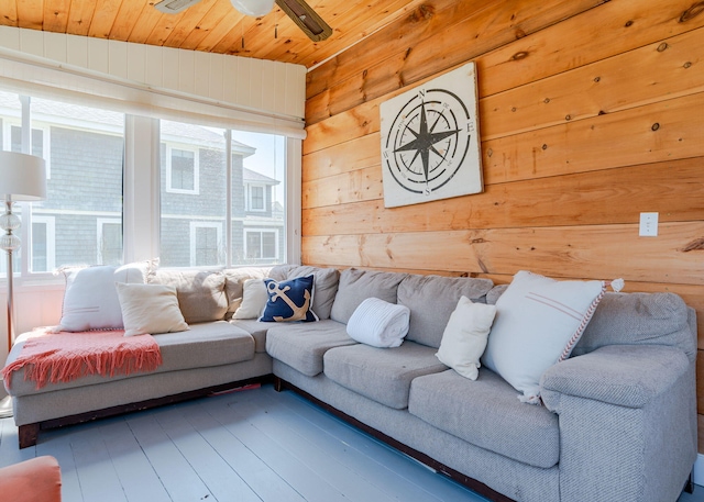 11 Saccarappa Ln, Scarborough, ME 04074 - living area featuring plenty of natural light, wood walls, wood finished floors, a ceiling fan, and wood ceiling