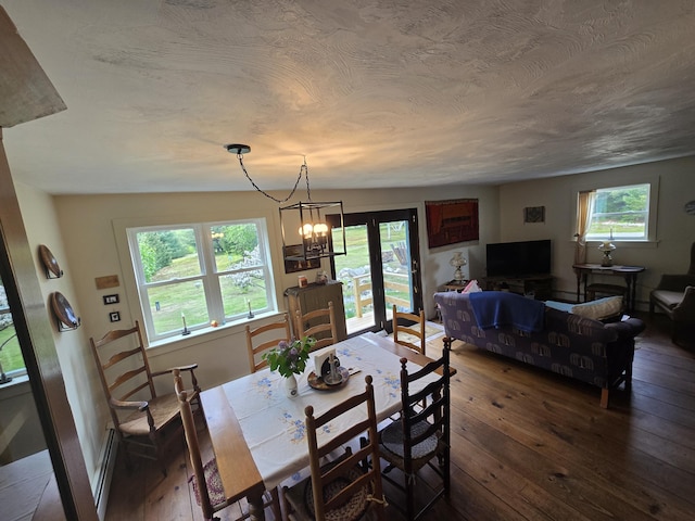 13 Bishop Farm Rd, Brownfield, ME 04010 - dining room featuring dark wood finished floors and a chandelier