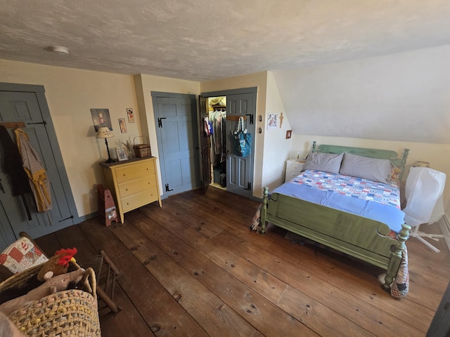 13 Bishop Farm Rd, Brownfield, ME 04010 - bedroom with dark wood finished floors and a closet