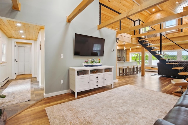 7 Scenic View Dr, Naples, ME 04055 - living room featuring wood ceiling with exposed beams, recessed lighting, stairway, high vaulted ceiling, and wood finished floors