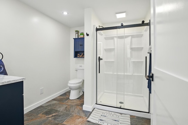 7 Scenic View Dr, Naples, ME 04055 - full bath with stone finish flooring, baseboards, a shower stall, toilet, and vanity